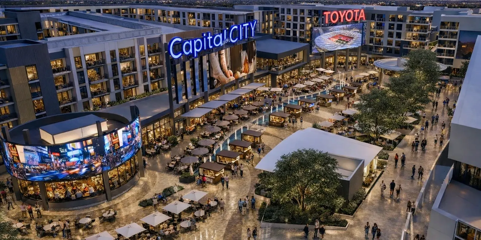 Aerial rendering of the Capital City district at dusk, with Toyota Arena at its centre