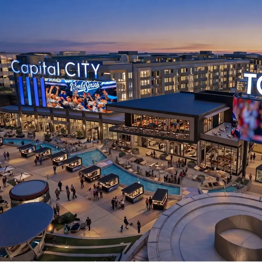 Toyota Arena under the Capital City sign, plaza busy below